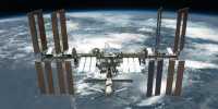 Astronauts Installing New Solar Panels to Boost the Orbital Outpost