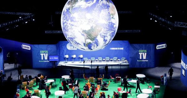 COP26: Last Draft of Climate Agreement Looks Weakened and “Depressing,” Say Critics