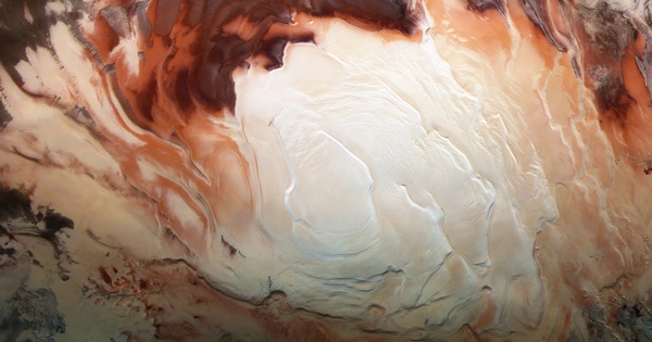 Is there Liquid Water beneath the South Polar Cap of Mars?