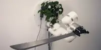 Watch A Houseplant Control A Robotic Arm Carrying A Machete, For Science