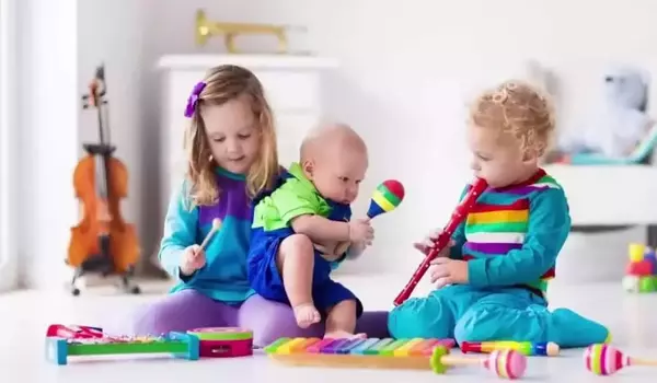 Sensitivity to musical rhythm supports social development in infants