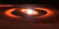 Hubble Observes Shadow Play around a Planet-forming Disk
