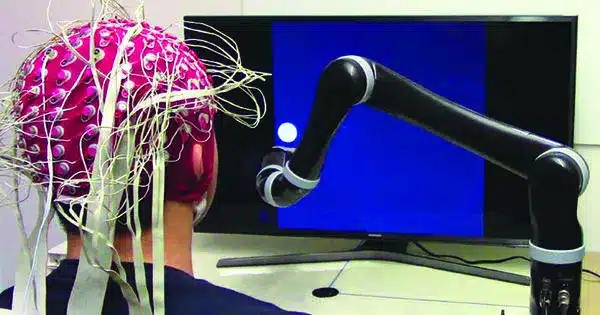 Cognitive strategies for augmenting the body with a wearable, robotic arm